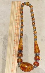 Faux Amber Lucite Egg Yolk Graduated Beaded Necklace Vintage 10”. Stunning necklace. The only thing wrong with it is...