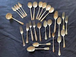 This lot features a set of 26 vintage flatware pieces from Dixon, made of silverplate and marked with Rogers Bros....