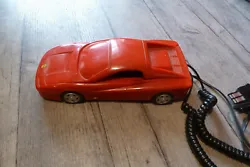 Téléphone ancien Ferrari Testarossa en état de marche et en belle état.