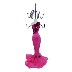This elegant dress mannequin jewelry stand is made of poly-resin and dressed in a satin gown with sequins detailing....