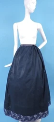 HEAVY GATHERS IN THE BUSTLE REAR WITH A SERIES OF STITCHED SLEEVES FOR BONING, THE BONING WAS REMOVED BUT BONING COULD...