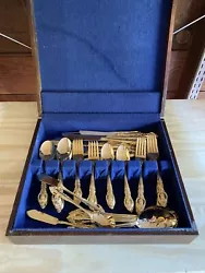 Vintage gold plated silverware set.  90 + pieces including serving utensils. All in good condition, rarely used.