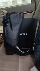Step out in style with these brand new knee high rain boots from COACH! The sleek lace-up closure ensures a snug and...