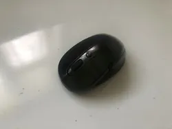 Wireless bluetooth mouse with on the fly DPI switch and two side thumb buttons. Requires 1 AA battery, not included....