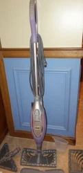 This is the Shark Professional Series Steam Mop. It is the purple model S3601CO. Great for any floors. Reusable...