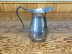 Pewter pitcher by Woodbury Pewterers.  6.25” high and 6.25” wide from spout to handle.  Tarnished .