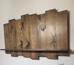 Beautiful handmade solid pine rustc wall art piece with display shelf. Stained in a dark walnut, and finished with 3...