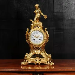 Antique French Rococo Ormolu Clock ~ Cupid. A stunning original antique French Rococo clock. The case made of finely...