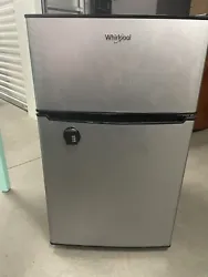 whirlpool mini fridge/freezer 3.1 cu +. Has a combination lock on fridge door.