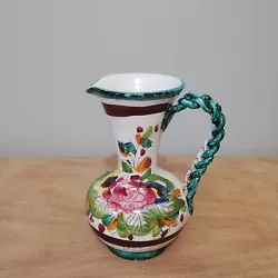 Vase italien en céramique à décor floral peint à la main. Lanse est joliment tressée, ce qui fait loriginalité de...