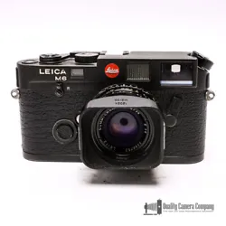 Included in this sale: Classic Leica M6. 72 With 35mm F2 Summicron Version 4 Bokeh King Check It Out. It shows average...