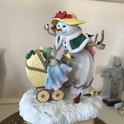 Wonderful and charming the sweet mama snow woman and her baby go out for a stroll with her a little bird friends, tons...