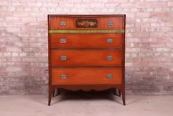 By John Widdicomb. A gorgeous French Provincial style four-drawer highboy dresser. USA, Circa 1920s. Mahogany, with...