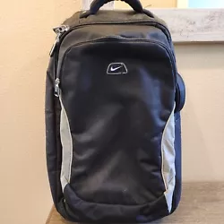 Nike Rolling Wheeled Backpack Travel Black Gray Bag. See pictures for measurements.   Preowned, bag shows signs of...