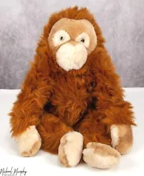He has soft orange-y brown plush with a tan face and hands and feet, and small brown safety eyes. In excellent...