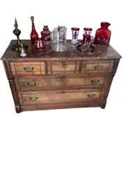 This dresser has been fully hand crafted and hand planed. Each of the drawers features dovetail joinery. It is Eastlake...