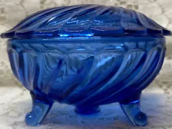 Blue Vaseline glass covered jar/dish. It is very elegant.