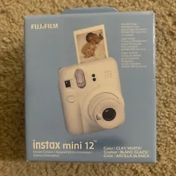 Capture your unforgettable moments with the Fujifilm Instax Mini 12 instant print film camera in a stylish Clay White...