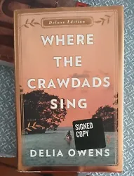 Where the Crawdads Sing Deluxe Edition by Delia Owens, SIGNED Hardcover. Front cover is slightly bent, some shelfwear...