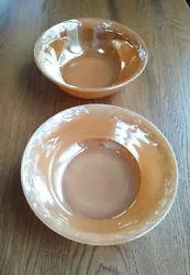 They both show slight utensil marks and light usage but are in great shape. Bowls are 8.25