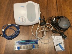 Cavitron Plus Gen 136. Good Condition. Includes 2 cavitron tips, box, and friction grip sleeve.