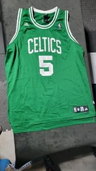 This Adidas NBA Boston Celtics Jersey #5 belongs to Kevin Garnett and is perfect for basketball enthusiasts who want to...