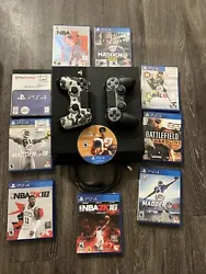 PS4 console with 2 working controllers along with 10 games. The games include 4 different years of NBA 2k, NHL 15,...