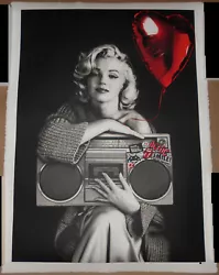 The print is hand-signed by Mr. Brainwash and numbered out of only 93. The back is thumb-printed, dated (2019), and...