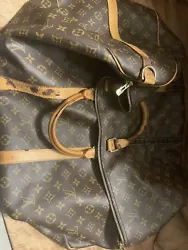Louis Vuitton Huge Travel Bag. Perfect inside but the outside is bad looks like burn marks. Comes with lock but no key....