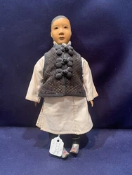 All his clothing is hand sewn; vest, muslin suit, shoes, pants, underclothes. 