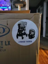 Graco 2048727 Modes Travel System with Stroller SnugRide and Snuglock 35 Car.... Condition is New. Shipped with USPS...