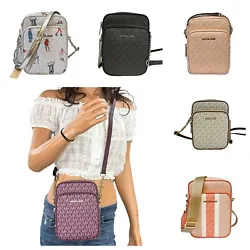 1 Zipper Pocket at Front Exterior. SHERBERT MULTI/ SILVER TONE HARDWARE WITH CANVAS STRAP. Strap: 20