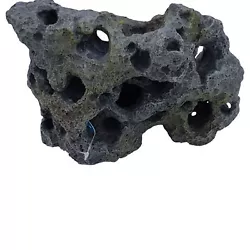 This artificial rock formation has small holes allowing for shy fish to swim and hide. They are 100% safe for fish made...