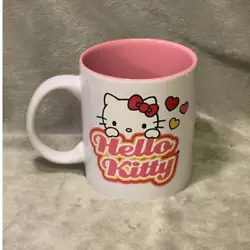 The mug features Hello Kitty in pink sparkle accents, large 3 1/4