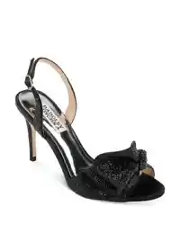The Badgley Mischka® Rennie sling back pump is a glamorous style for an evening occasion. Strap across the vamp with...