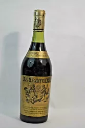 Vin de liqueur exclusivité Henri Maire à Arbois (Jura). 1 Vieille Bouteille de vin du Jura 