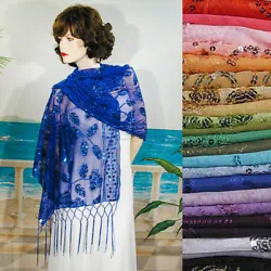 Sheer sequined embroidered oblong shawl. This elegant wrap is the perfect accessory for dressy and formal occasions....