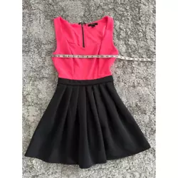Style: Skater Dress. Features: Pleated. Dress Length: Mini. Color: Pink.