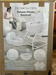Introducing the Delta Childrens Deluxe Moses Bassinet in Elephant Dreams (model number 27250-2112). This...