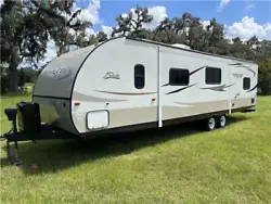 This 35 Shasta Bumper pull single slide RV trailer is ready to go Camping.  4 Bunks aft and queen forward.  New queen...
