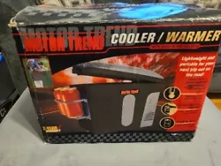 Motor trend cooler/warmer portable unit holds up to 8 cans has carry strap and is in great condition.