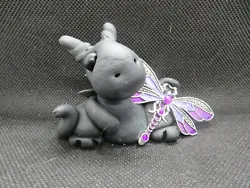 This dragon likes the color purple. They are made for mature children to adults. They are semi fragile and are to be...