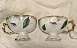 Pink and green leaves. 22 karat gold accents in a scalloped fade effect from the rim, on the handle and around the rim...