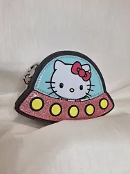 Loungefly Hello Kitty Coin Purse Flying Saucer. Zipper works, Colorful and unique Hello Kitty, but there are some...