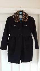 This is a beautiful girls wool coat by Gucci, it is fully lined and is button front with Gucci on the buttons. It has...