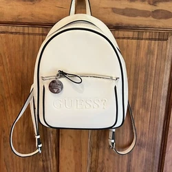 Women’s Guess backpack white zipper shoulder bag. Small flaw on the small handle, see pictures for details.Paid $120