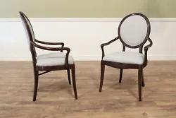 These are solid mahogany round-back dining room chairs with engineered performance fabric in Nomad Snow. They are an...