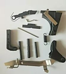 Glock 19 Gen 1-3 Lower Parts Kit. - Slide Lock. - Slide Lock Spring. - Slide Stop Lever with Spring. Kit includes...