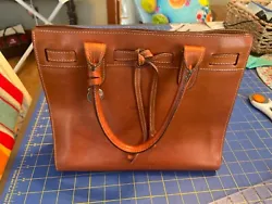 Beautiful authentic leather Dooney & Bourke handbag. Sold as-is.