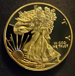 In the form of a 2020 Liberty Coin. Fine Gold Coin. 999 100 milligrams. Mirror proof standard size troy oz coin.